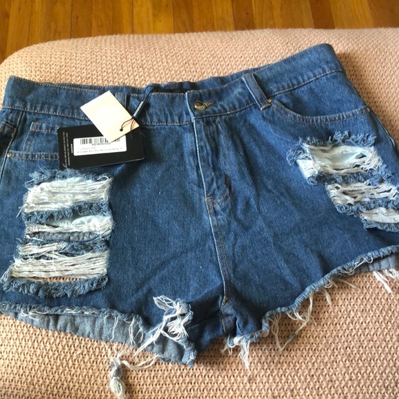 ripped bum denim shorts